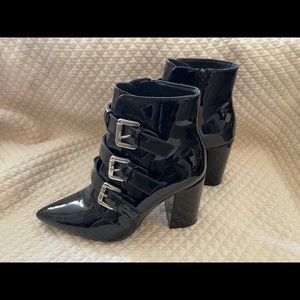 Black made made material shoes